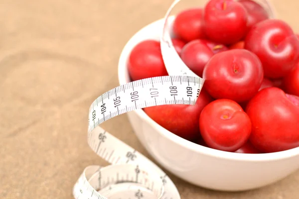 Salad and tape measure — Stock Photo, Image