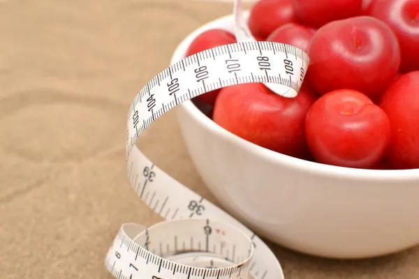 Salad and tape measure — Stock Photo, Image