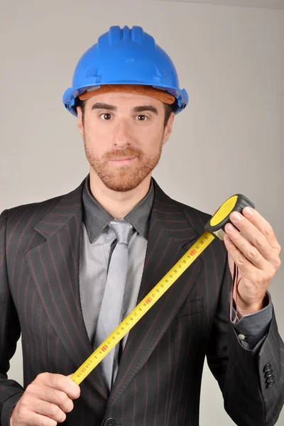 Architect with blueprints in hand — Stock Photo, Image