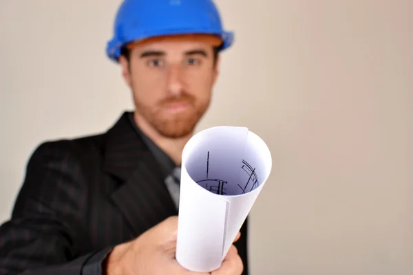 Architect with blueprints in hand — Stock Photo, Image