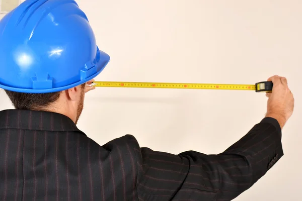 Architect with blueprints in hand — Stock Photo, Image