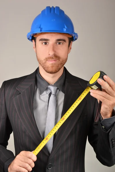 Architect with blueprints in hand — Stock Photo, Image