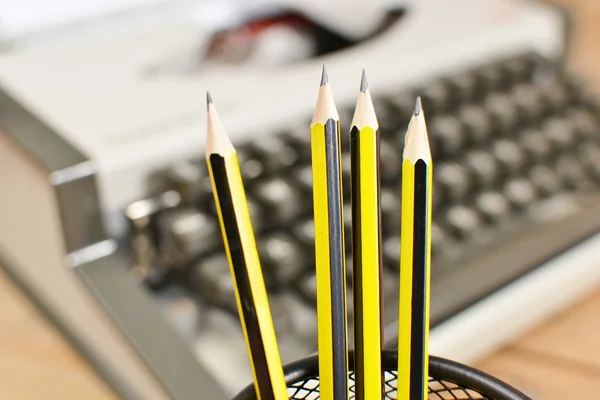 Typewriter and pencils — Stock Photo, Image