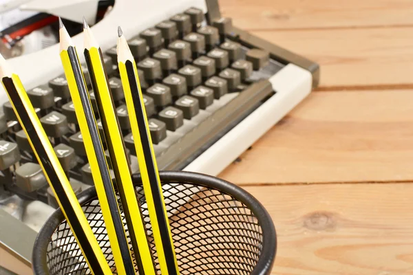 Typewriter and pencils — Stock Photo, Image