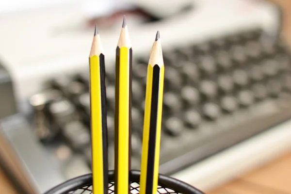 Typewriter and pencils — Stock Photo, Image