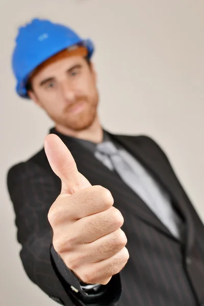 Architect with blueprints in hand — Stock Photo, Image