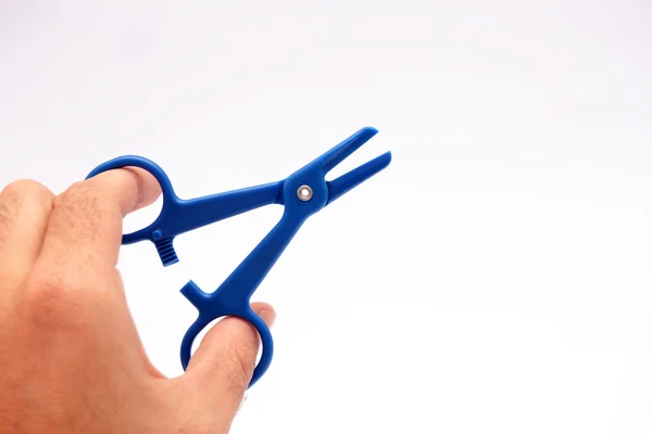 Hand with scissors operation — Stock Photo, Image