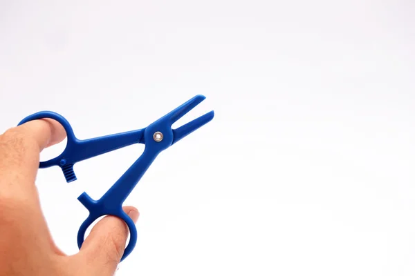 Hand with scissors operation — Stock Photo, Image