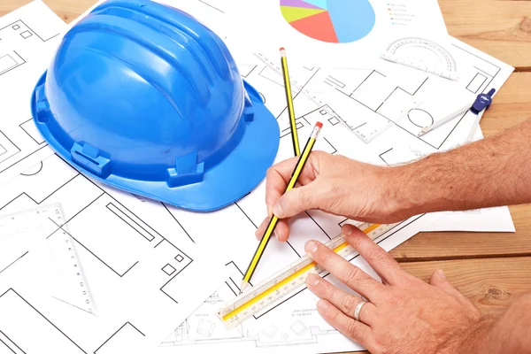 Architect with architectural material — Stock Photo, Image