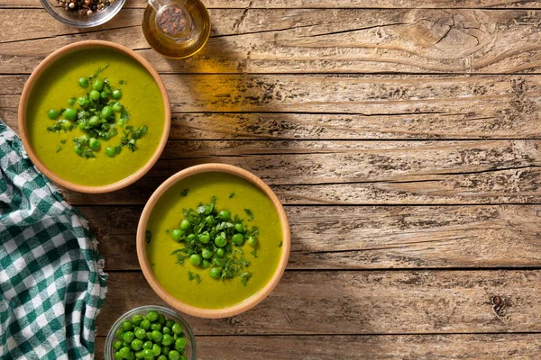 Green Pea Soup Wooden Bowl Rustic Wooden Table Top View — Stockfoto