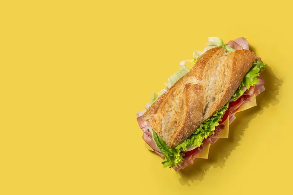 Submarine Sandwich Ham Cheese Lettuce Tomatoes Onion Mortadella Sausage Yellow — Stock Photo, Image