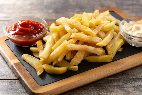 Fried Potatoes Ketchup Mayonnaise Wooden Table — Photo