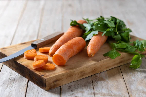 Cutting Raw Carrots Wooden Table — Stock Photo, Image