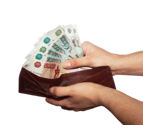 Women's hands reach from the wallet of cash fan — Stock Photo, Image