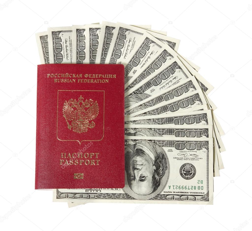 Hundred dollar bills fan with a passport