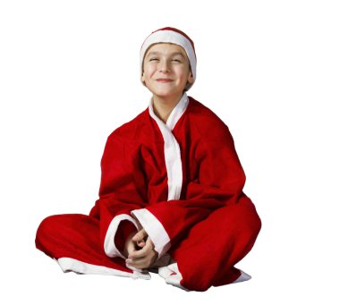 gülen çocuk üzerinde beyaz bir backgr poz bir Noel Baba kıyafeti