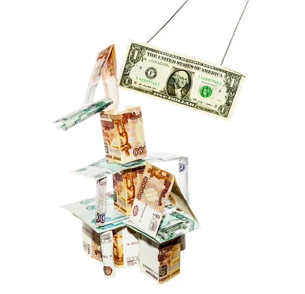 Dollar breaks the house built from rubbles — Stock Photo, Image