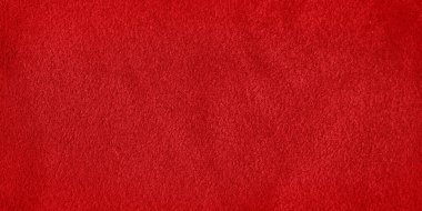 Kırmızı kadife desenli bir makro fotoğraf. Kırmızı süet deri dokusu..