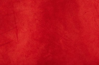 Keçeleşmiş makro. Kırmızı süet kumaş. Kumaş, deri, tasarımcılar için malzeme..