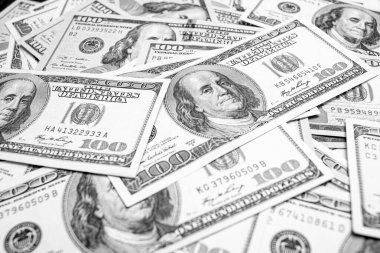 Background consists of American dollar bills. Financial and banking concept.