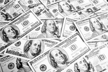Background consists of American dollar bills. Financial and banking concept.