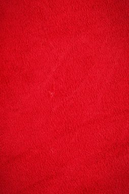 Kadife kırmızısı arka plan yakın plan fotoğrafı. Kırmızı süet hakiki deri arka plan.