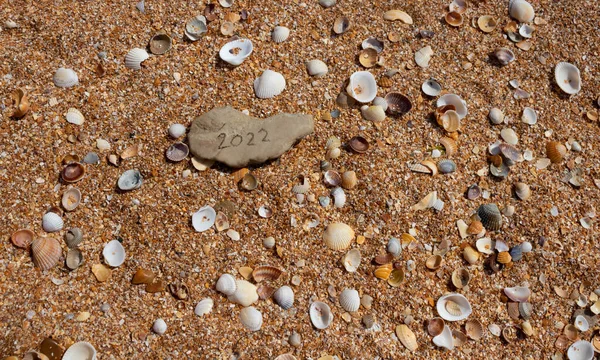 Una Imagen Los Números 2022 Escritos Una Piedra Playa Concepto — Foto de Stock