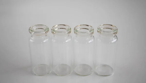 Пустые Стеклянные Бутылки Хранения Лекарств Жидкостей Белом Фоне — стоковое фото