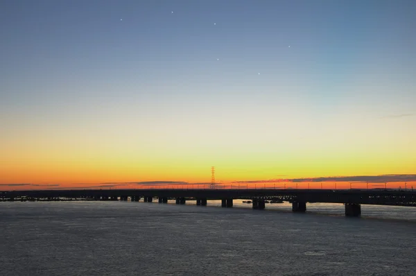 Ponte de Amur e por do sol (estrelas pintadas ) Imagens Royalty-Free