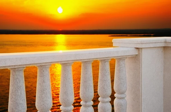 Balaustrada y puesta de sol Imagen De Stock