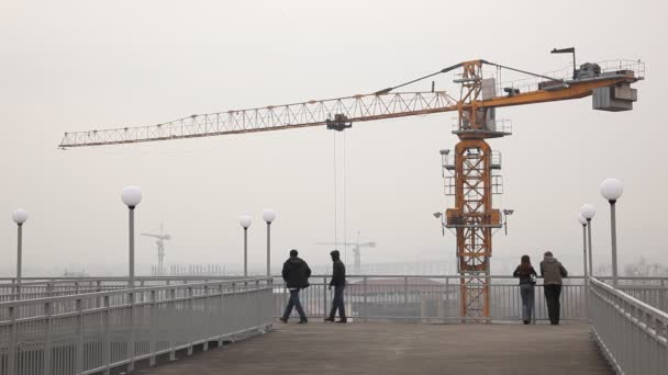 Tower cranes & some people Stock Footage