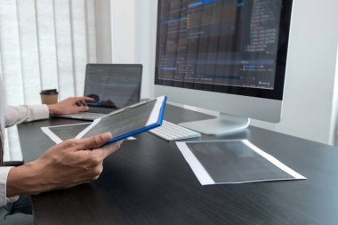 Programmer, Man working with computer programming, professional development, and coding technology, working on high-quality visual software development websites.