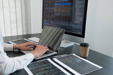 Programmer, Man working with computer programming, professional development, and coding technology, working on high-quality visual software development websites.