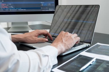 Programmer, Man working with computer programming, professional development, and coding technology, working on high-quality visual software development websites.