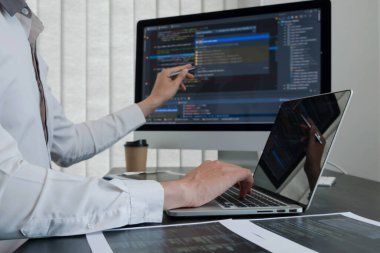 Programmer, Man working with computer programming, professional development, and coding technology, working on high-quality visual software development websites.