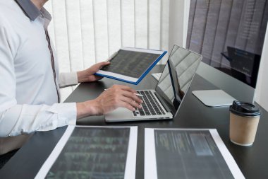 Programmer, Man working with computer programming, professional development, and coding technology, working on high-quality visual software development websites.