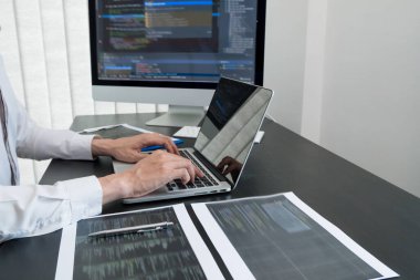 Programmer, Man working with computer programming, professional development, and coding technology, working on high-quality visual software development websites.