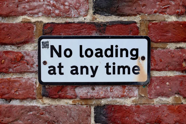Sign Brick Wall Which Prohibits Loading Vehicle Any Time — Stock Fotó