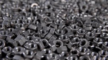 Paslanmaz çelik DIN 934 fındık siyah arka planda vida