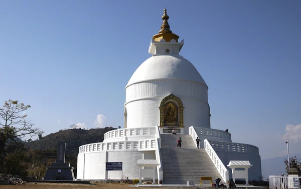 The outlook of Peace Pagoda in hill area in pokhara — Stock Photo, Image