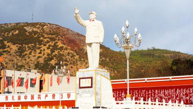 Chairman Mao statue in Lijiang new town clipart