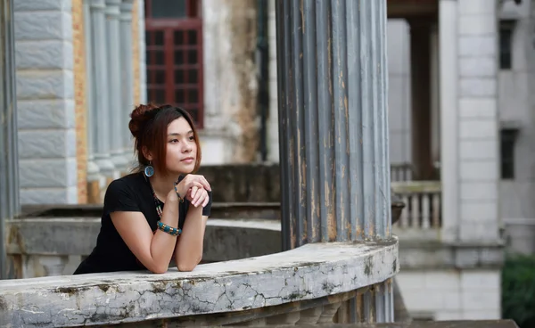 Chinese model with different pose on the old balcony in vintage house — Stock Photo, Image