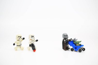 Hong Kong - April 4 2022: The Mandalorian take care his baby yoda