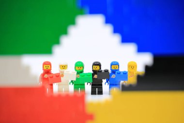 Hong Kong - July 4 2022: six people in red, black, blue, yellow, white and black color make as a team and dress like astronaut