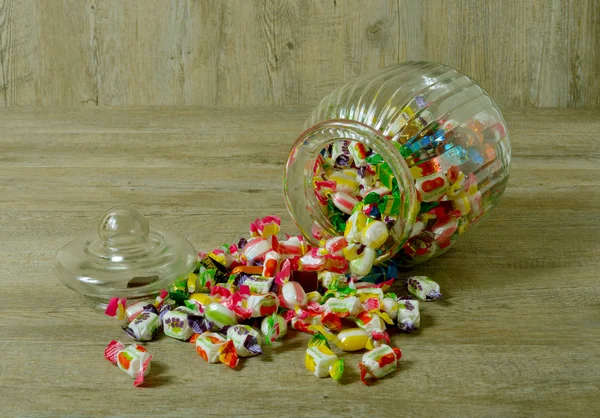 Glass jar with candies — Stock Photo, Image