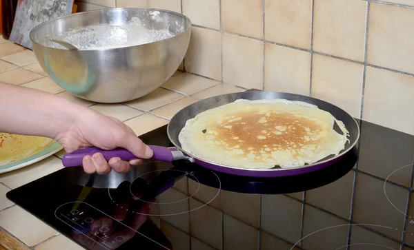 Pancake batter into a skillet — Stock Photo, Image