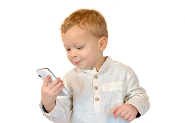 Baby met een mobiele telefoon — Stockfoto