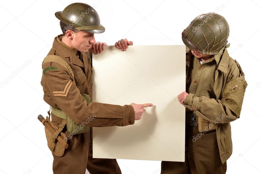 bristish and american soldier show a poster
