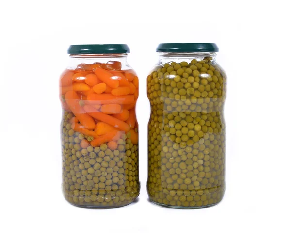 Jar of peas and carrots — Stock Photo, Image