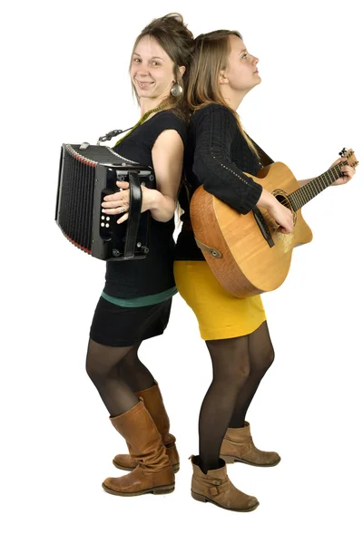 Twee meisjes afspelen van muziek — Stockfoto